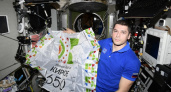 Флаг 650-летия Кирова приняли российские космонавты на Международной космической станции